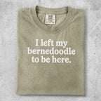 Comfort Colors shirt with "I left my bernedoodle to be here" text.