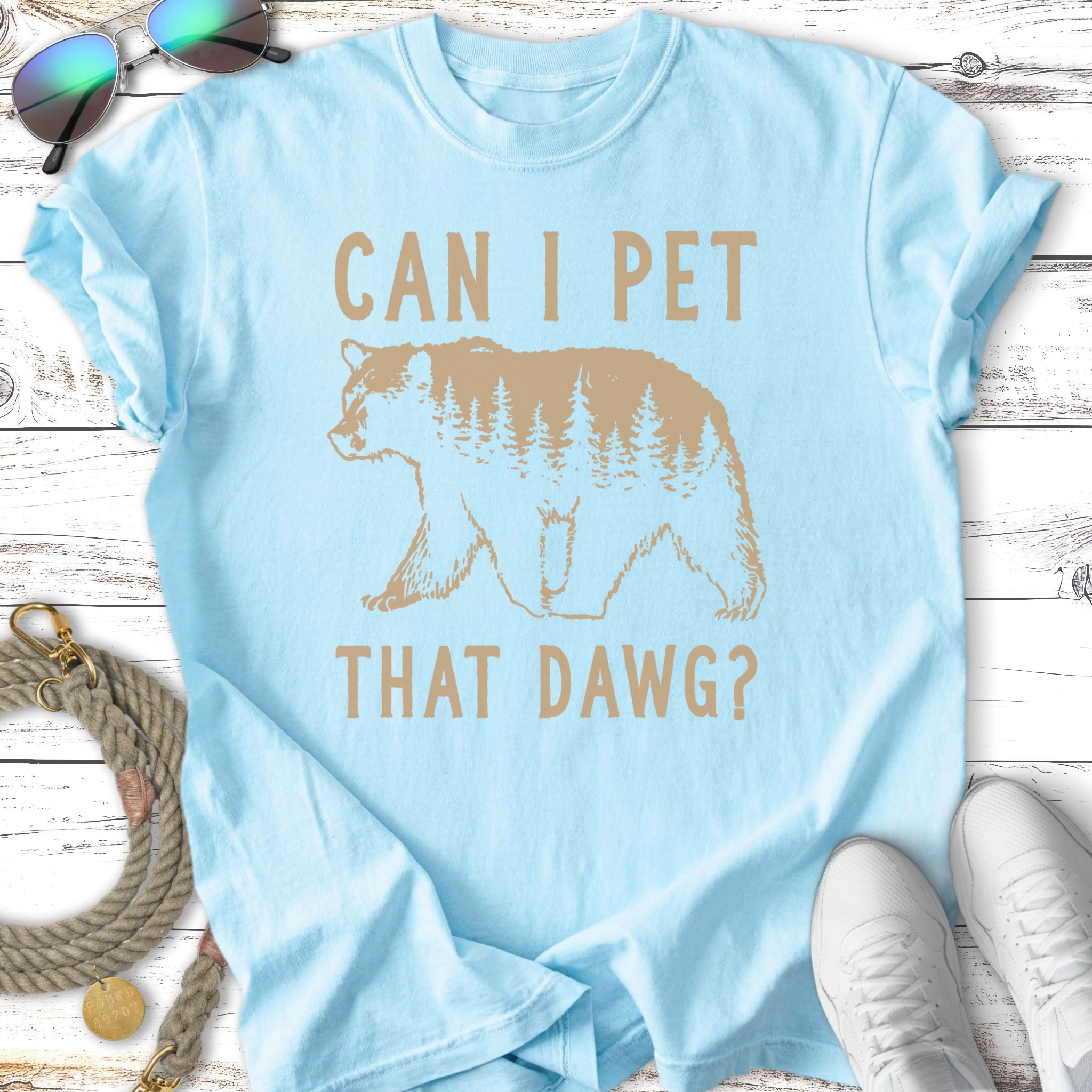 Light blue t-shirt with "Can I Pet That Dawg?" and bear silhouette design.