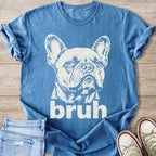 French bulldog graphic t-shirt with text "bruh" on a blue shirt.