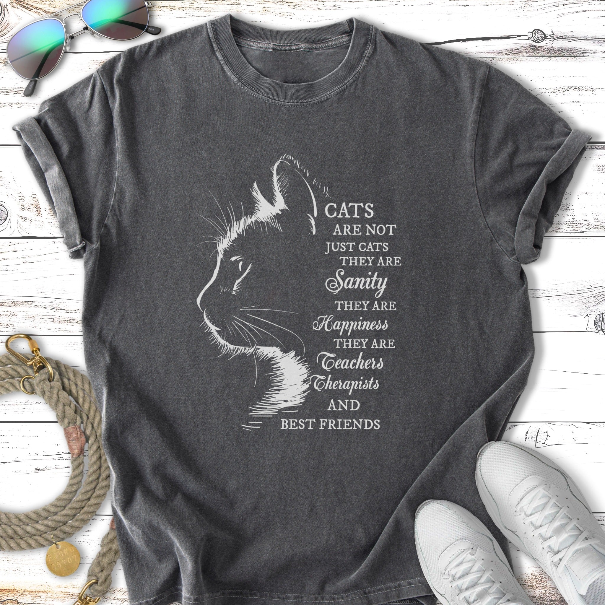 T-shirt with cat silhouette and text: Cats are not just cats, they are sanity, happiness, teachers, therapists and best friends.