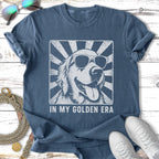 Golden Retriever wearing sunglasses with text "IN MY GOLDEN ERA".