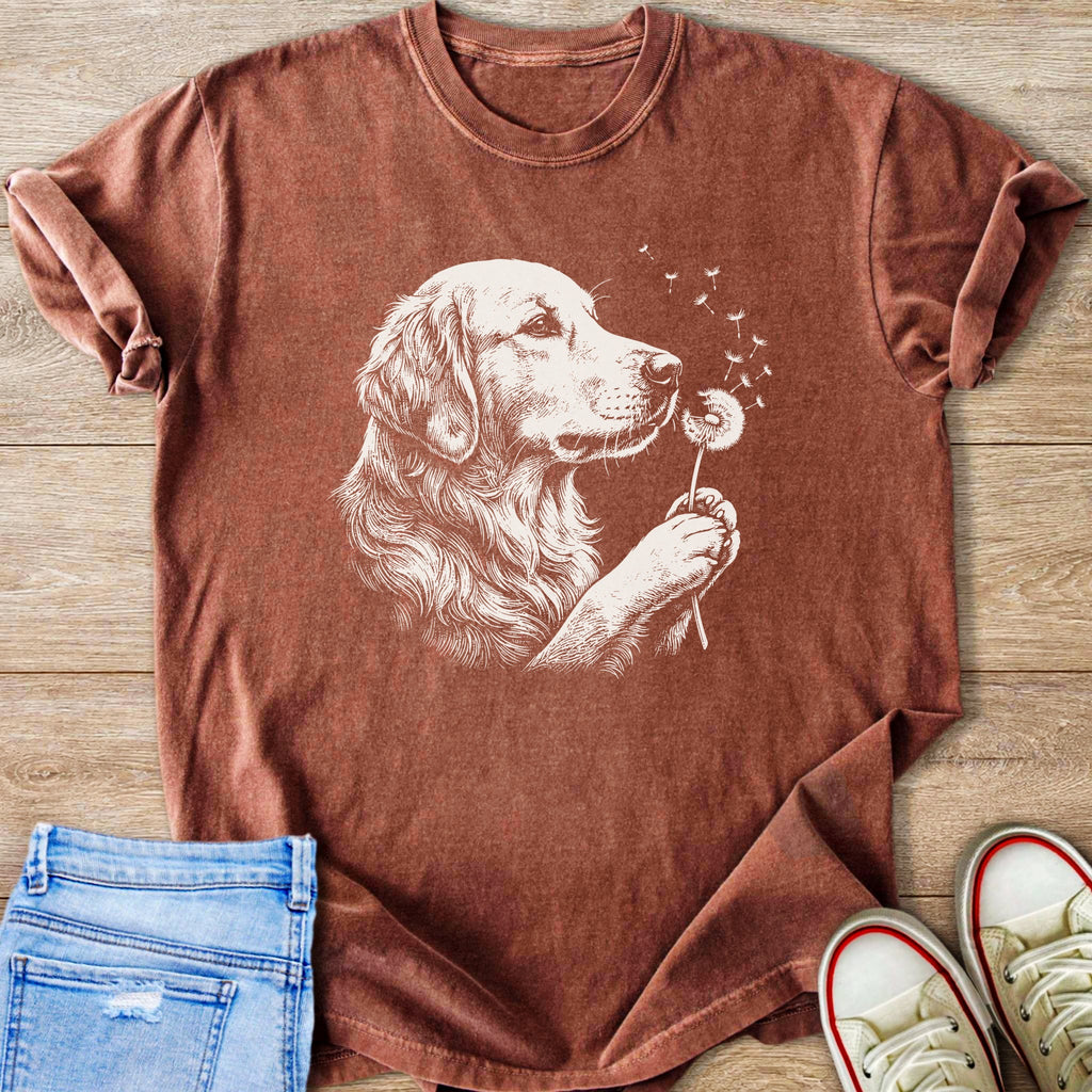 T-shirt with sketch of golden retriever blowing dandelion seeds.