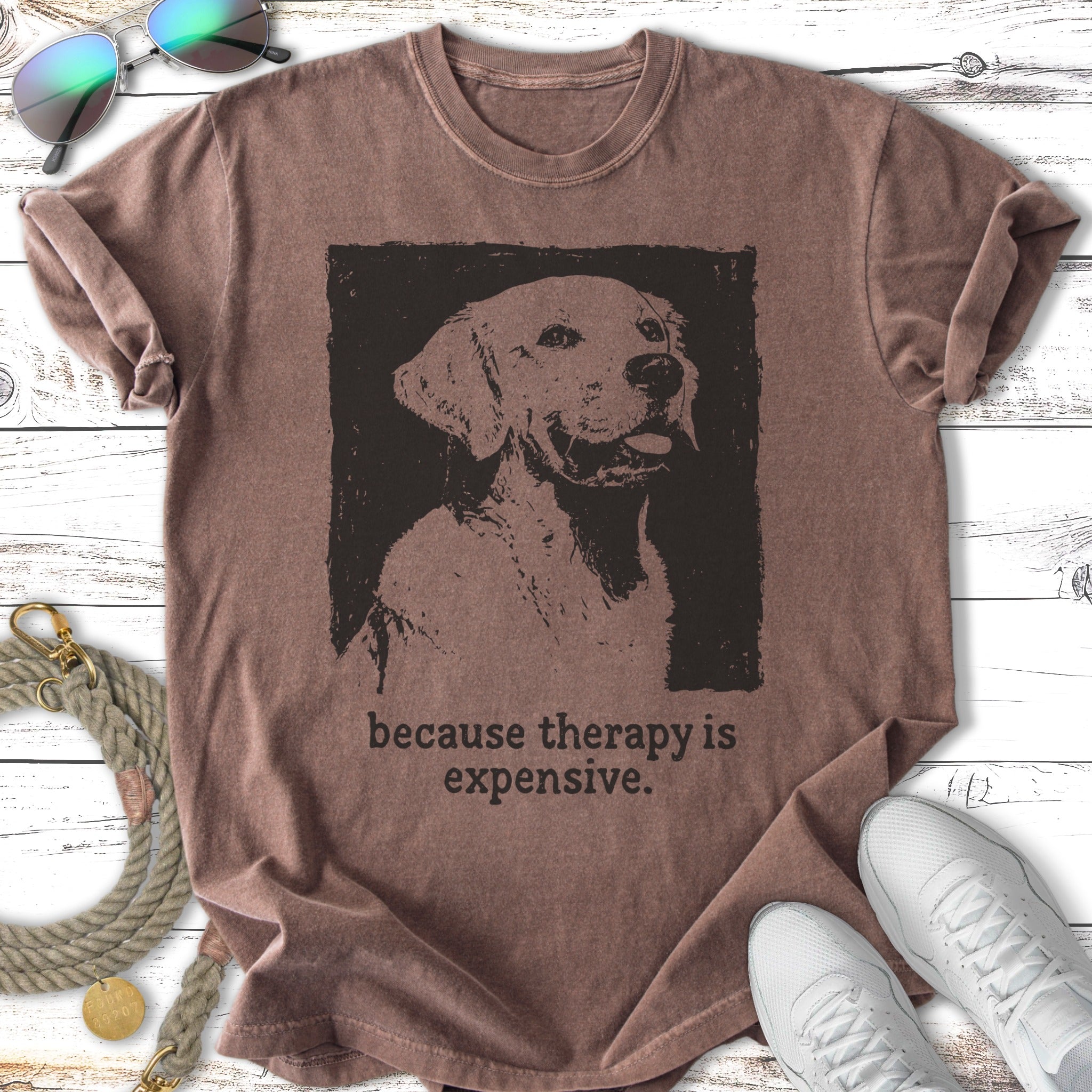 T-shirt with a distressed black and white dog portrait and "because therapy is expensive."