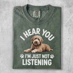 Dog with text "I hear you, I'm just not listening."