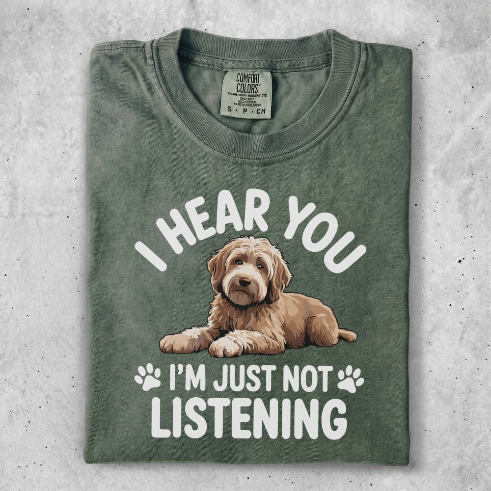 Dog with text "I hear you, I'm just not listening."
