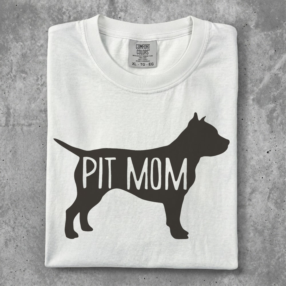 White t-shirt with "PIT MOM" in a dog silhouette.