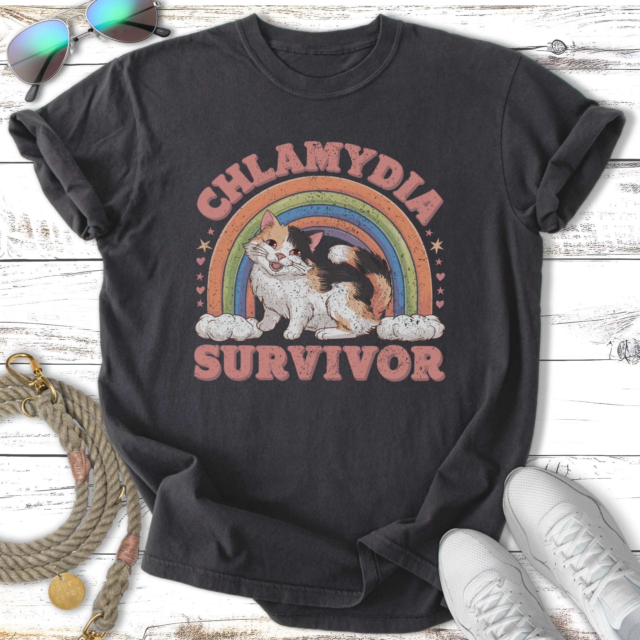 Chlamydia survivor text on a vintage rainbow t-shirt.