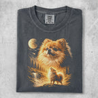T-shirt featuring a Pomeranian dog howling at the moon in a forest scene.