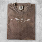 Brown Comfort Colors t-shirt with "coffee & dogs." and paw print graphic.