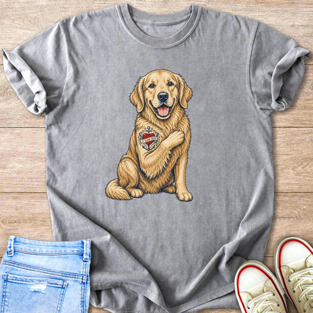 Golden retriever wearing a t-shirt with an "I Love Mom" tattoo.