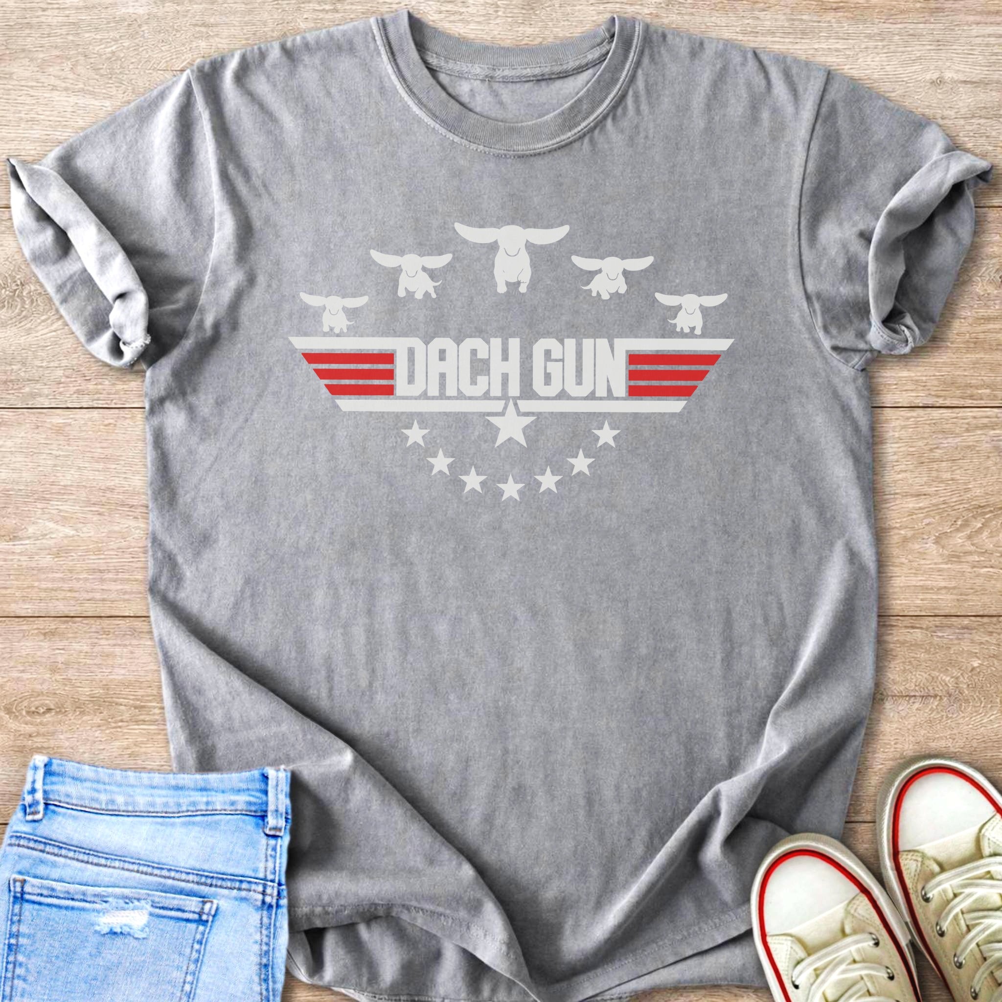 Gray t-shirt with white dachshund graphic and "DACH GUN" text.