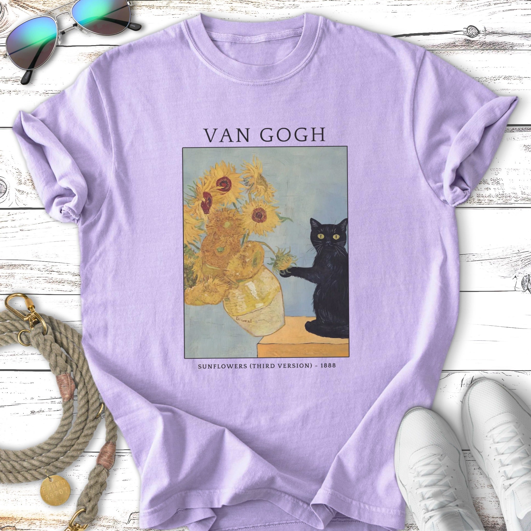 Purple t-shirt with Van Gogh's Sunflowers painting and a black cat.