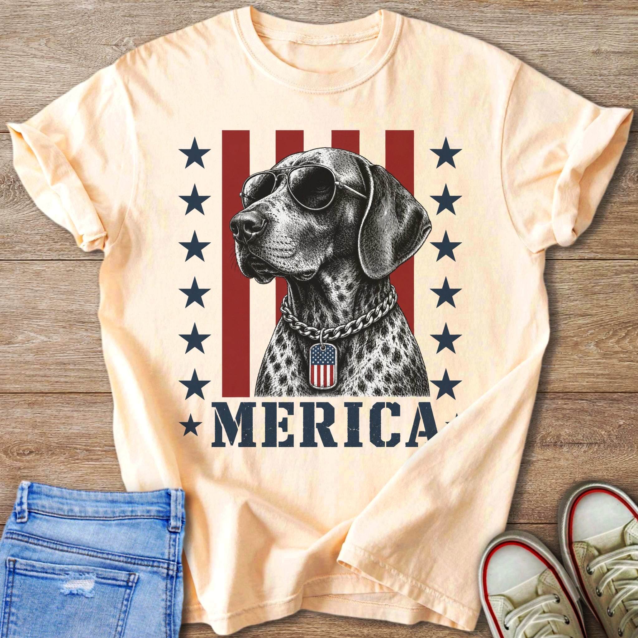 Sleek dog wearing sunglasses and an American flag tag, with "MERICA" below.