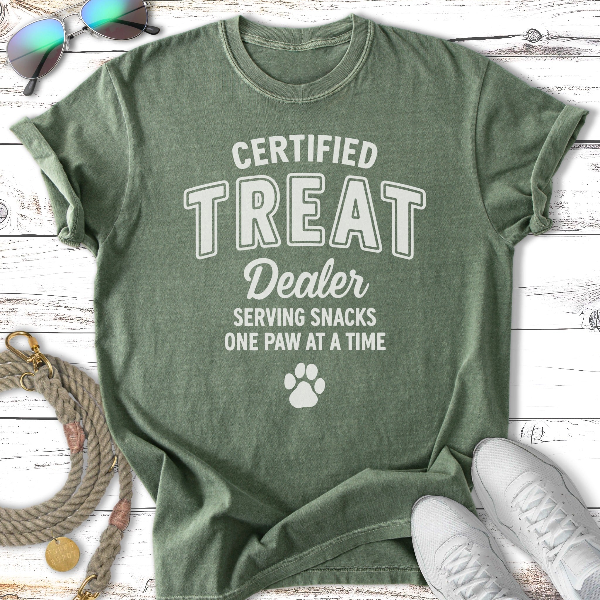 Green t-shirt with "Certified Treat Dealer Serving Snacks One Paw at a Time" and paw print.