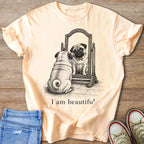 Peach t-shirt with pug looking in mirror and text "I am beautiful".