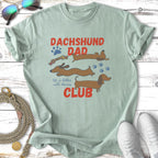 Dachshund Dad Club t-shirt with three dachshunds and paw prints.