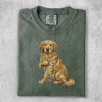 Golden retriever wearing a t-shirt with an "I Love Mom" heart graphic.