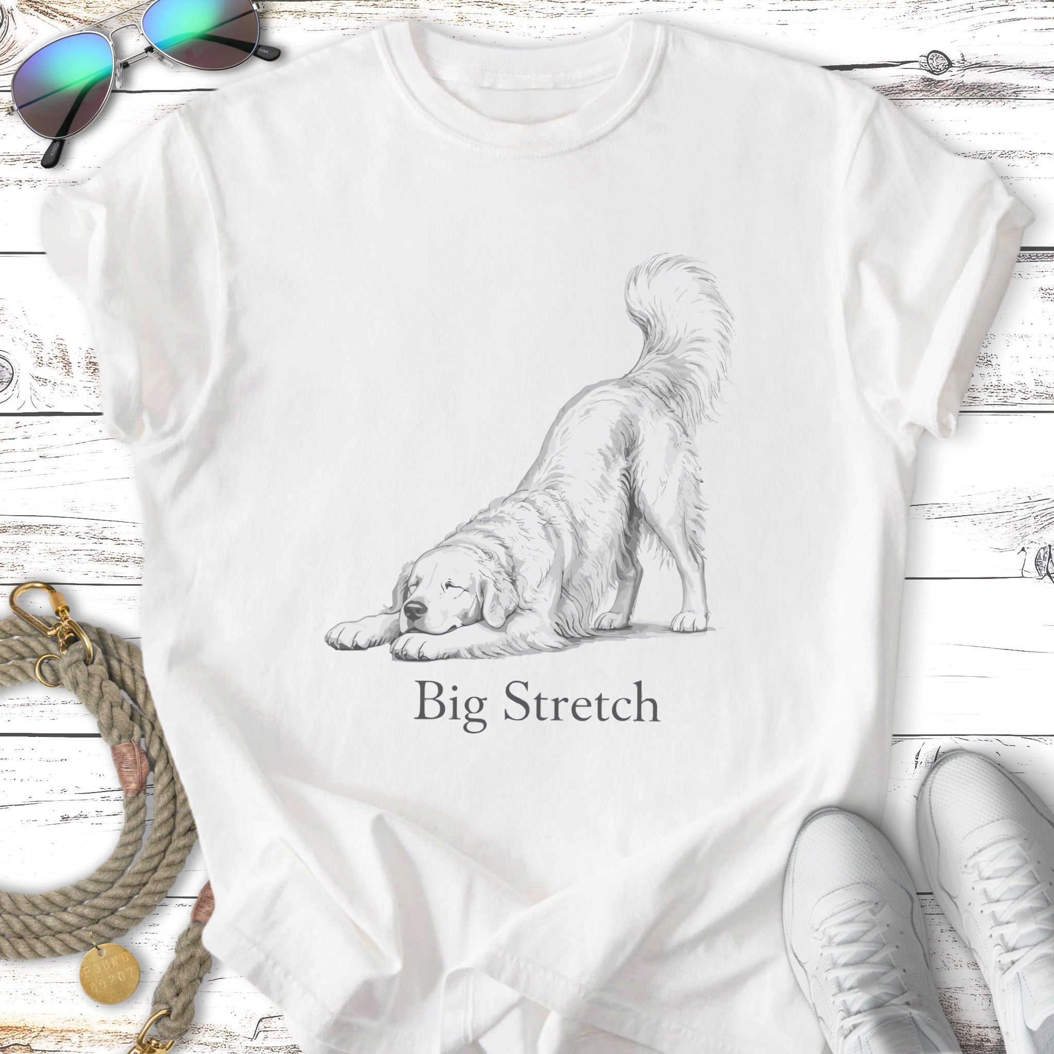 White t-shirt with sketch of a dog in a "big stretch" pose.