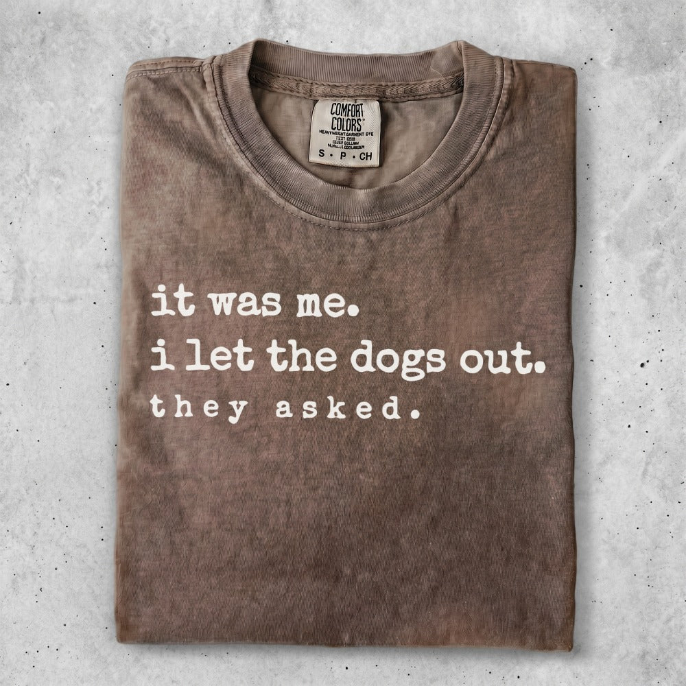 Brown t-shirt with "it was me. i let the dogs out. they asked." text.