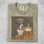 Bernese Mountain Dog wearing sunglasses and a hat, watching beer being poured.