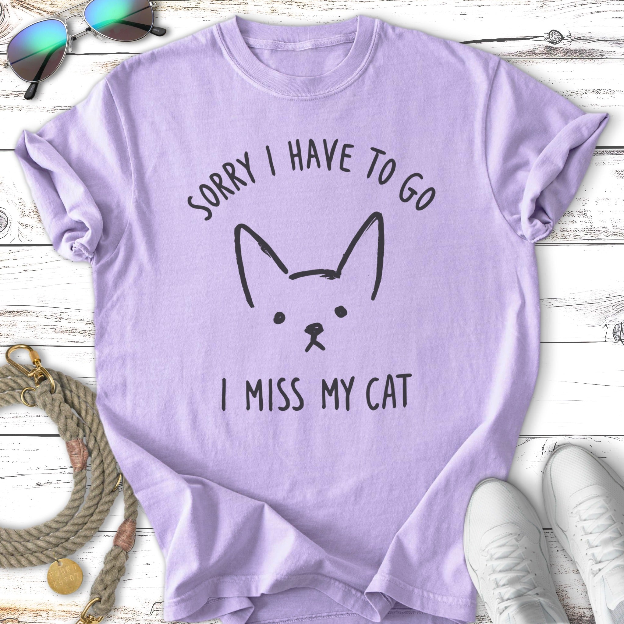 Lavender t-shirt with "SORRY I HAVE TO GO I MISS MY CAT" and a cat face.