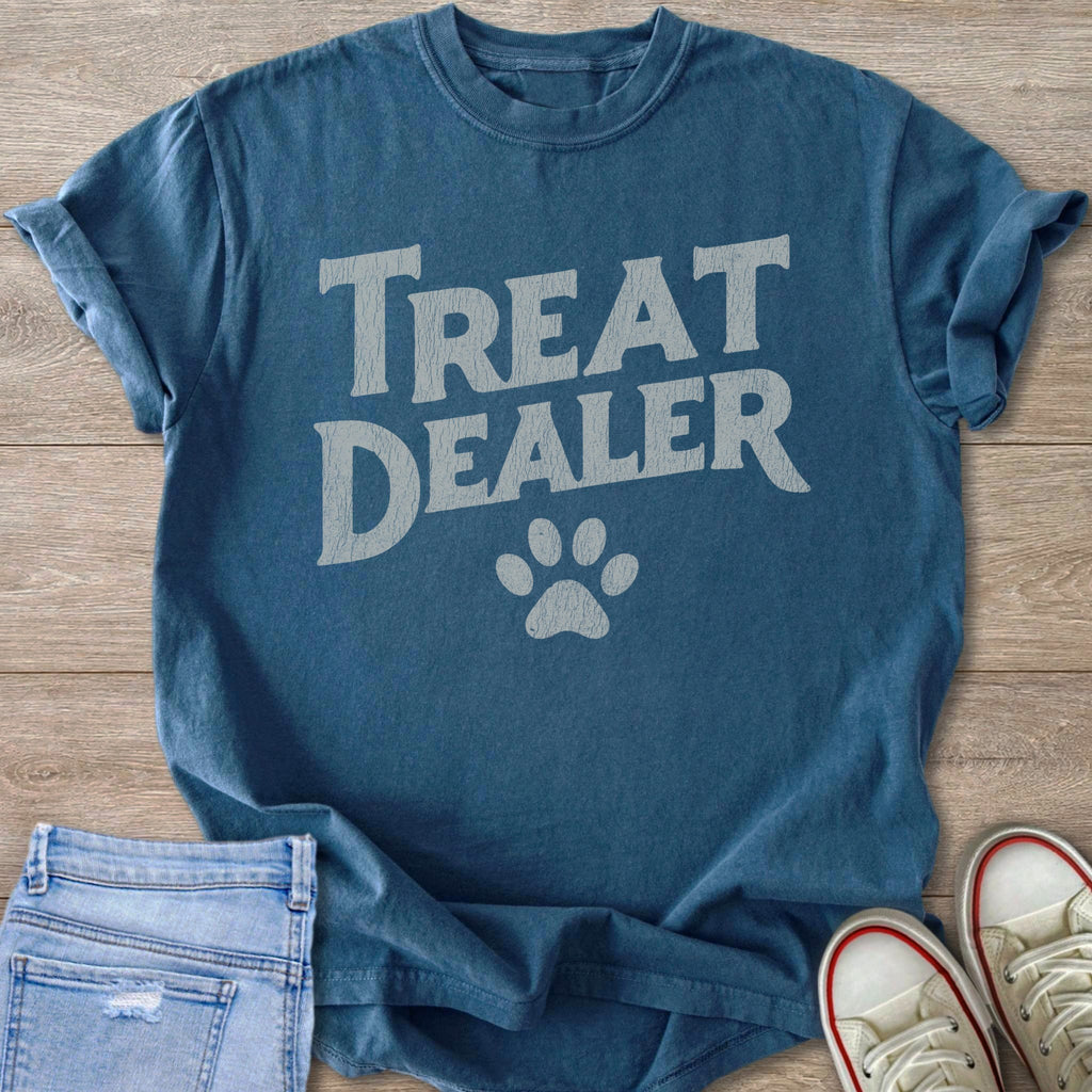 Blue t-shirt with "TREAT DEALER" text and paw print.
