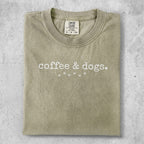 Comfort Colors t-shirt with "coffee & dogs." text and small paw prints.