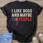 Black t-shirt with text "I like dogs and maybe 2 people" with a crossed-out 2.