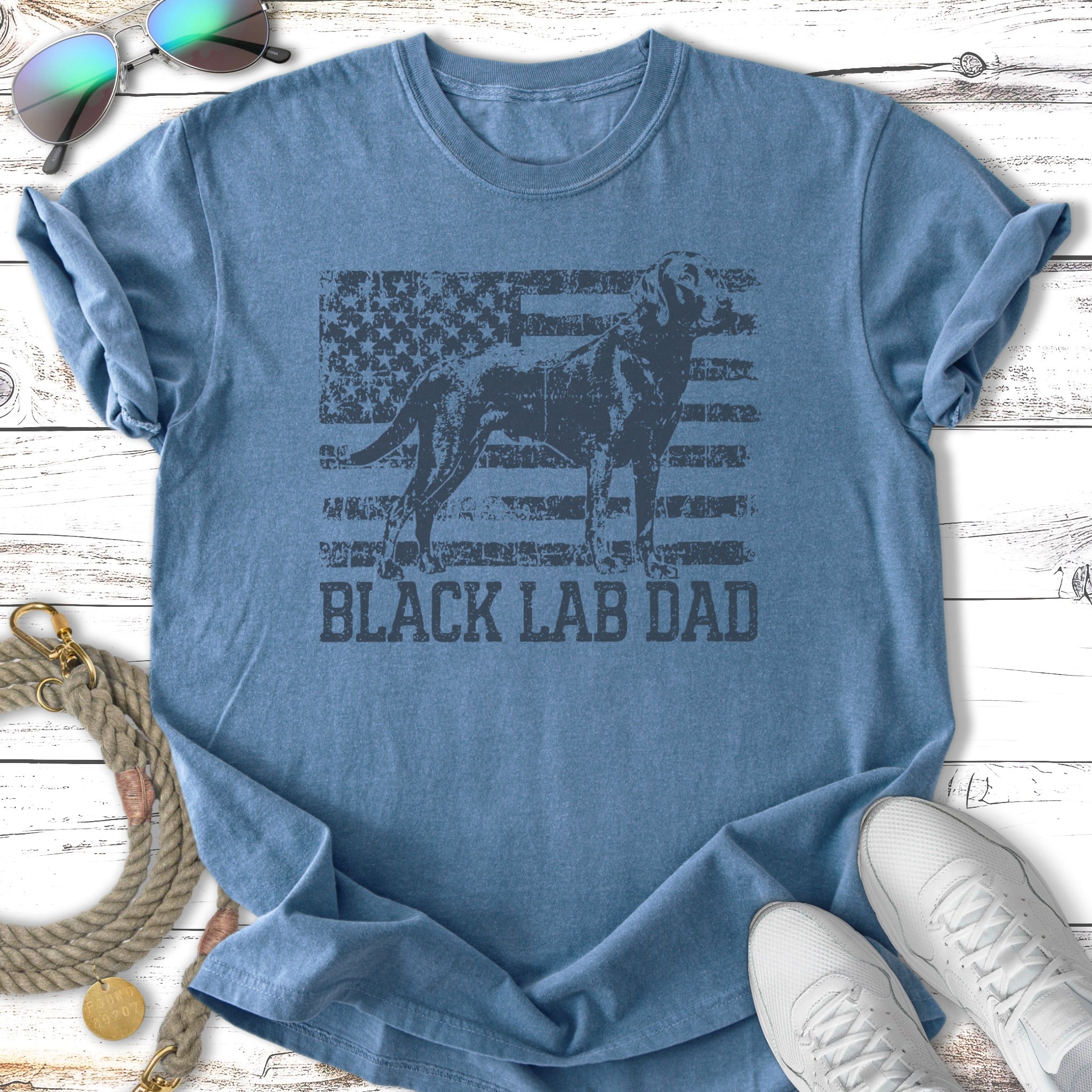 Black Labrador silhouette against an American flag with "BLACK LAB DAD" text.