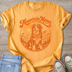 Orange t-shirt with a dog and mountain graphic and "Mountain Mama" text.