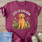 Golden Retriever dog sitting in flowers with "Life is Golden" text.