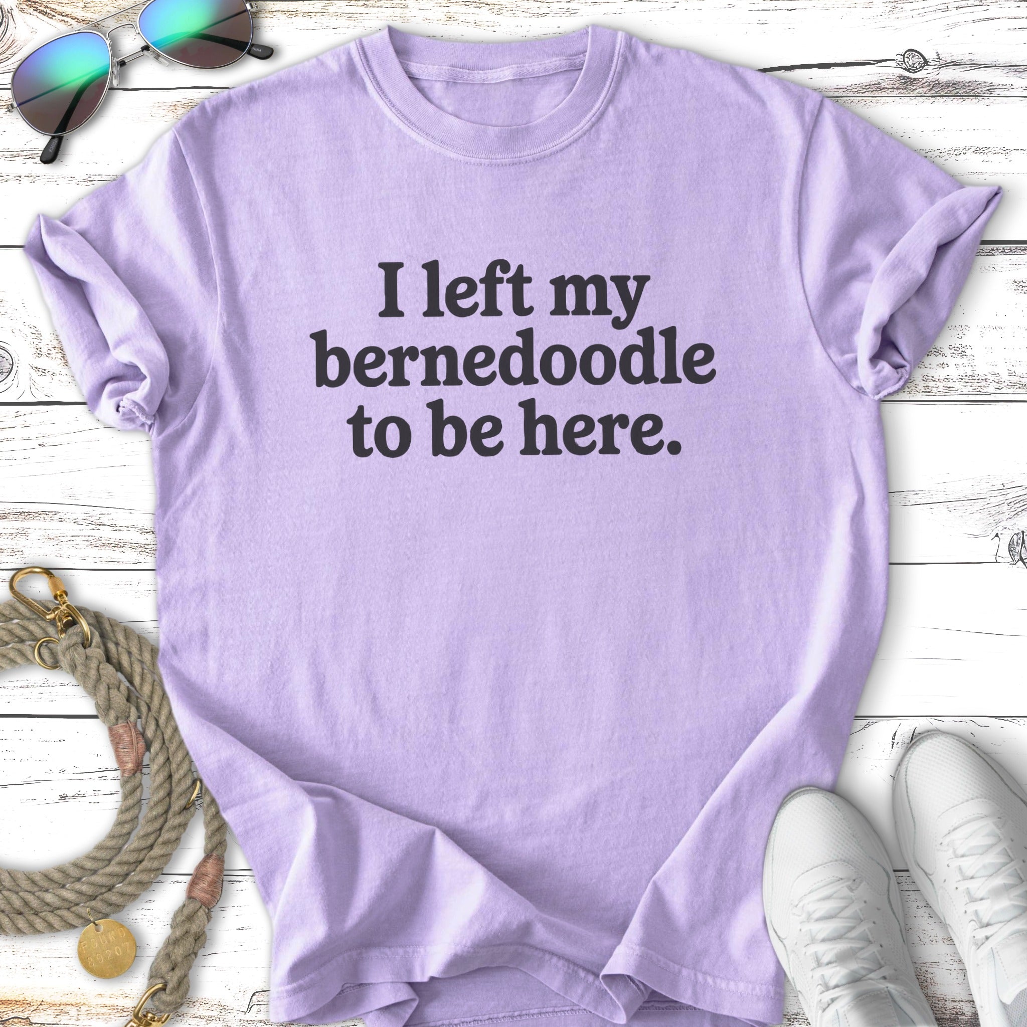 Lavender t-shirt with text "I left my Bernedoodle to be here."