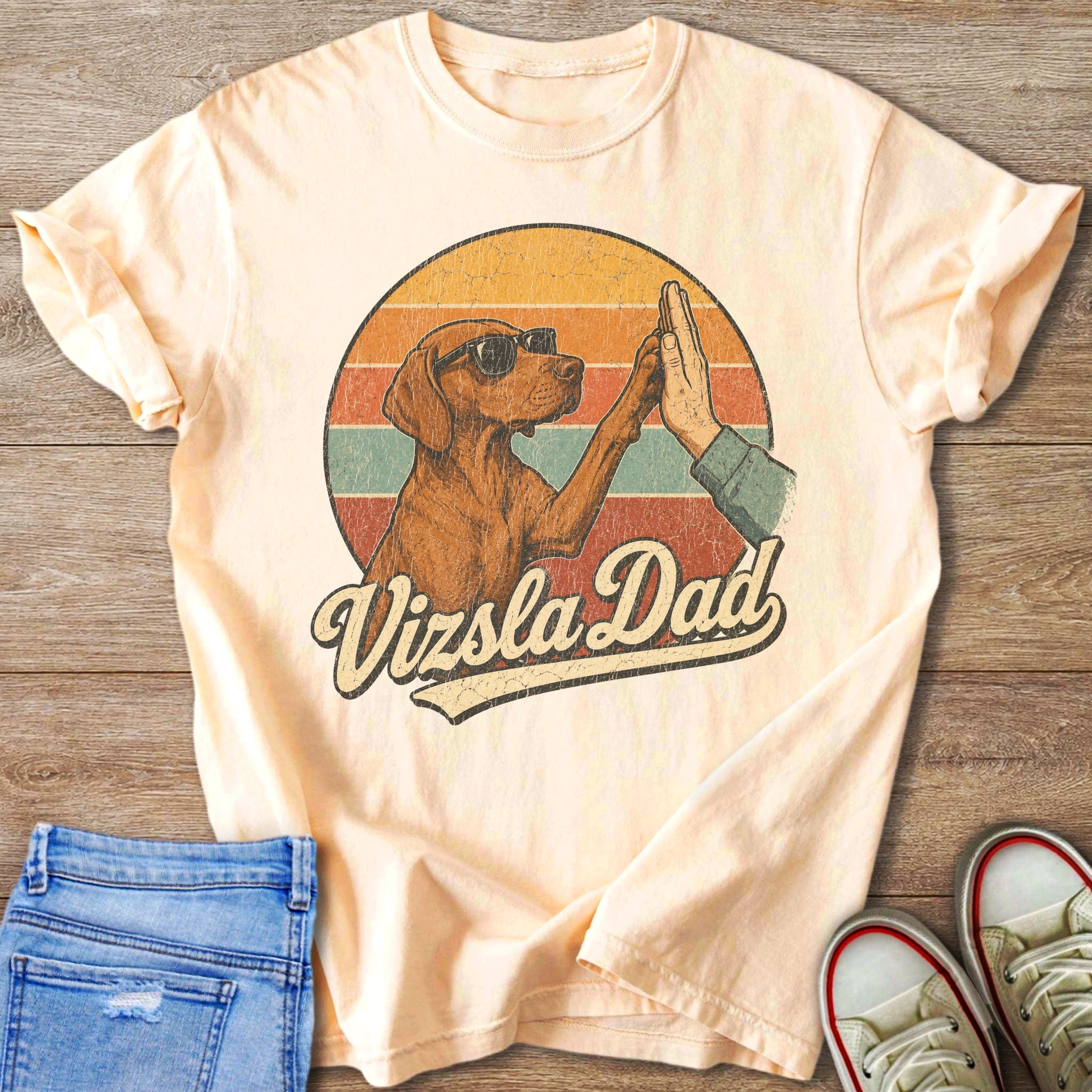 Vizsla dog wearing sunglasses gives a high five with text "Vizsla Dad".