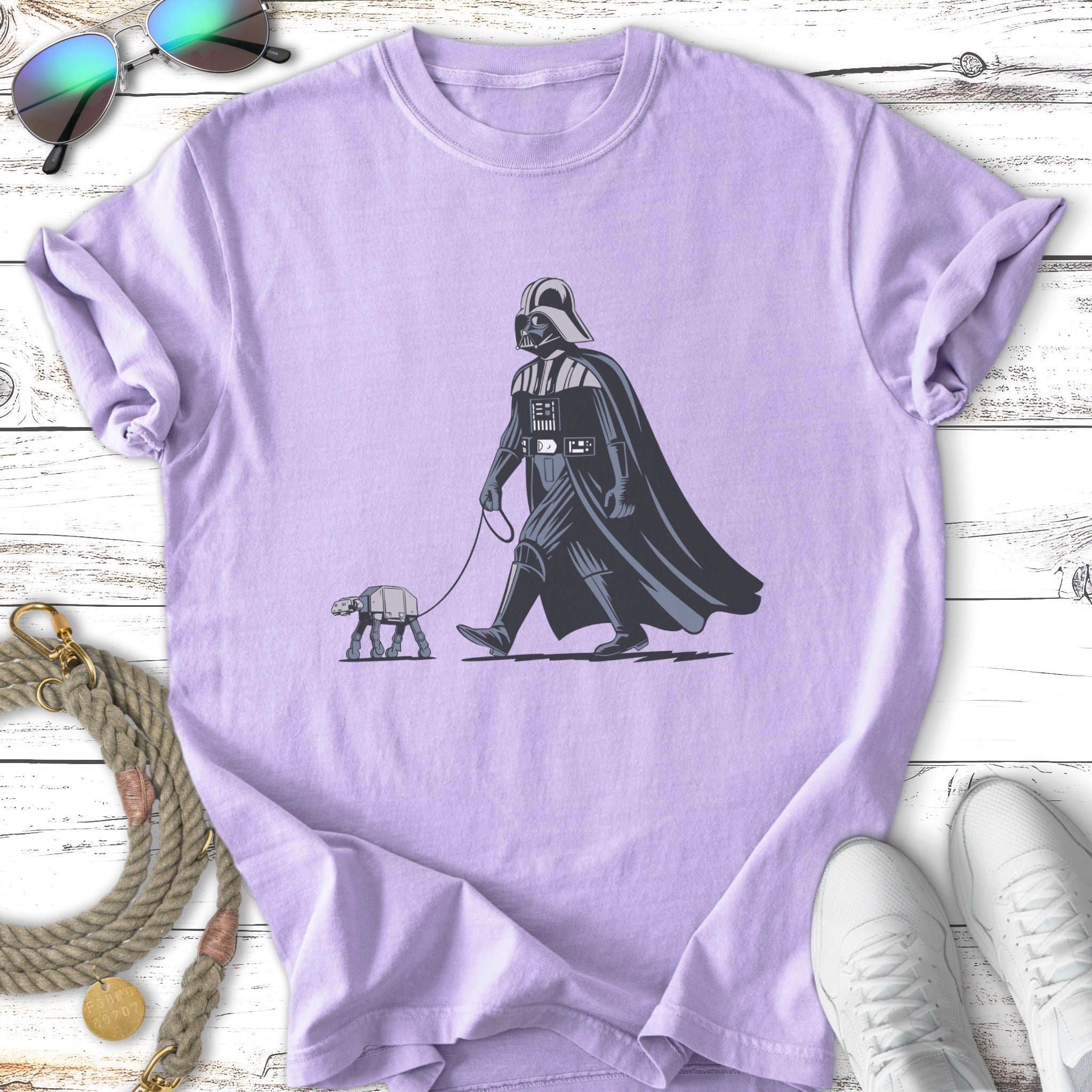 Darth Vader walks an AT-ST on a leash.