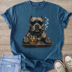 Dog wearing sunglasses, smoking cigar, with glass of whiskey on wooden table.