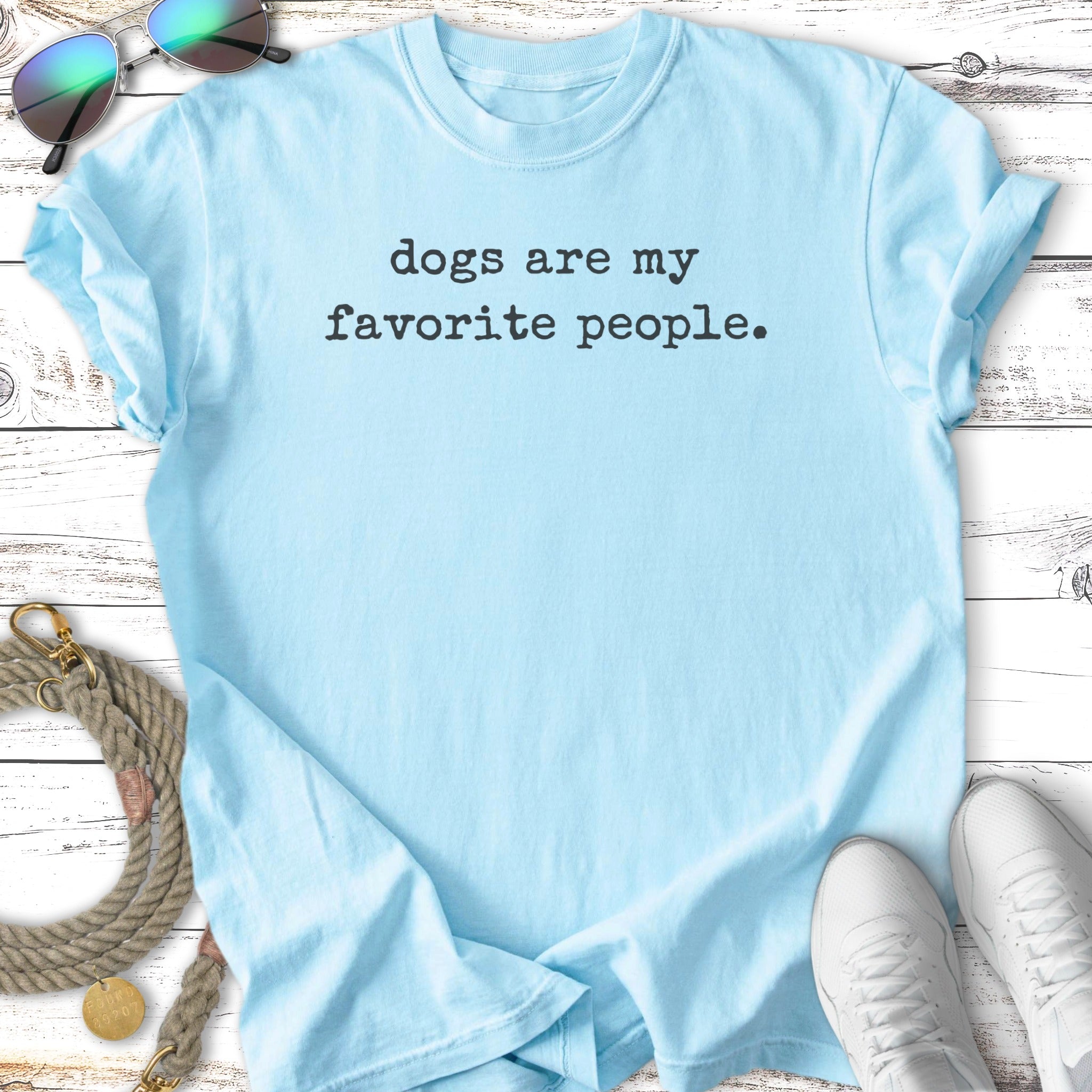 Light blue t-shirt with "dogs are my favorite people." text.