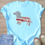 Light blue t-shirt with a dachshund applique in American flag pattern.
