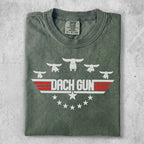 Green t-shirt with "DACH GUN" and dachshund silhouettes in a wing design.