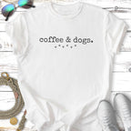 White t-shirt with "coffee & dogs." text and paw prints.