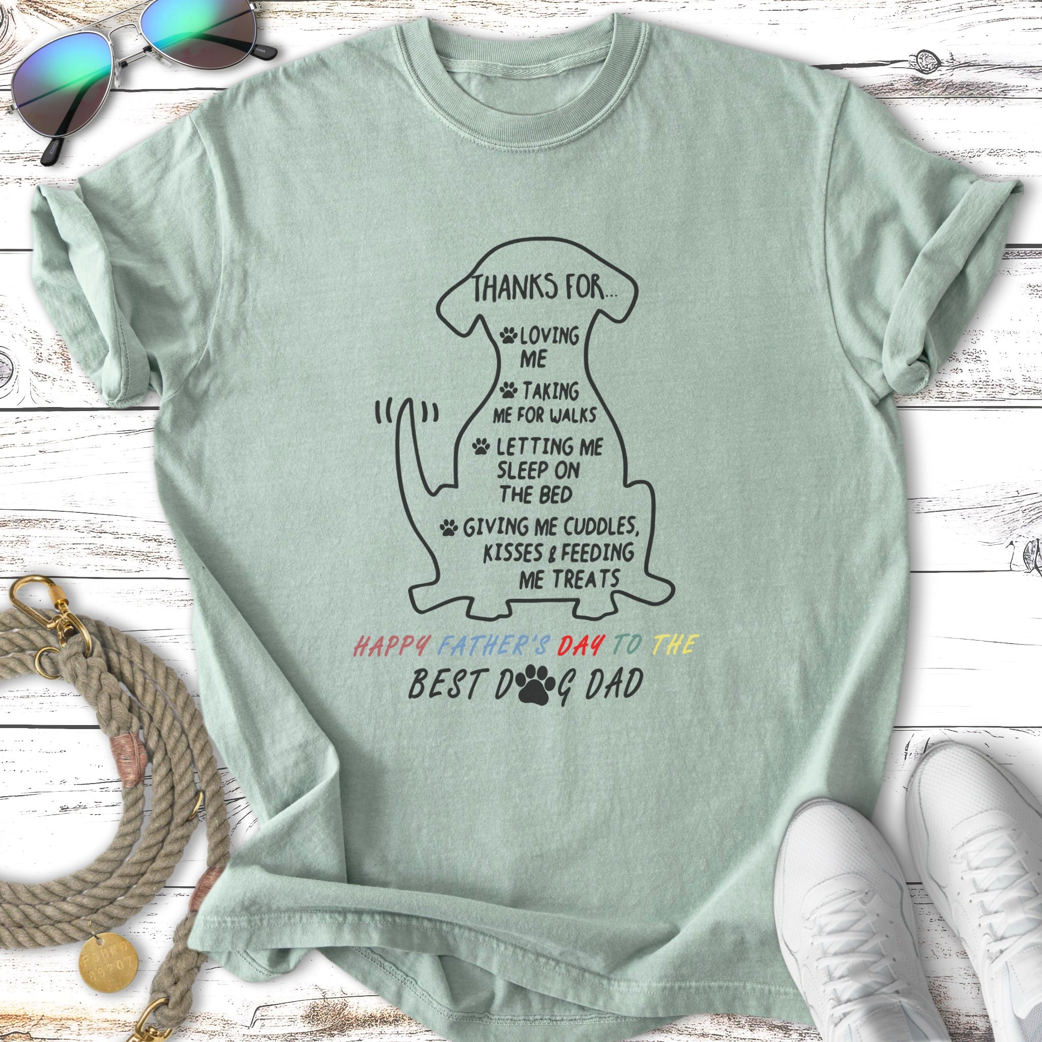 Light mint t-shirt with dog-themed Father's Day text and graphics.