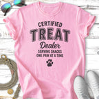 Pink t-shirt with "Certified Treat Dealer" and paw print graphic.