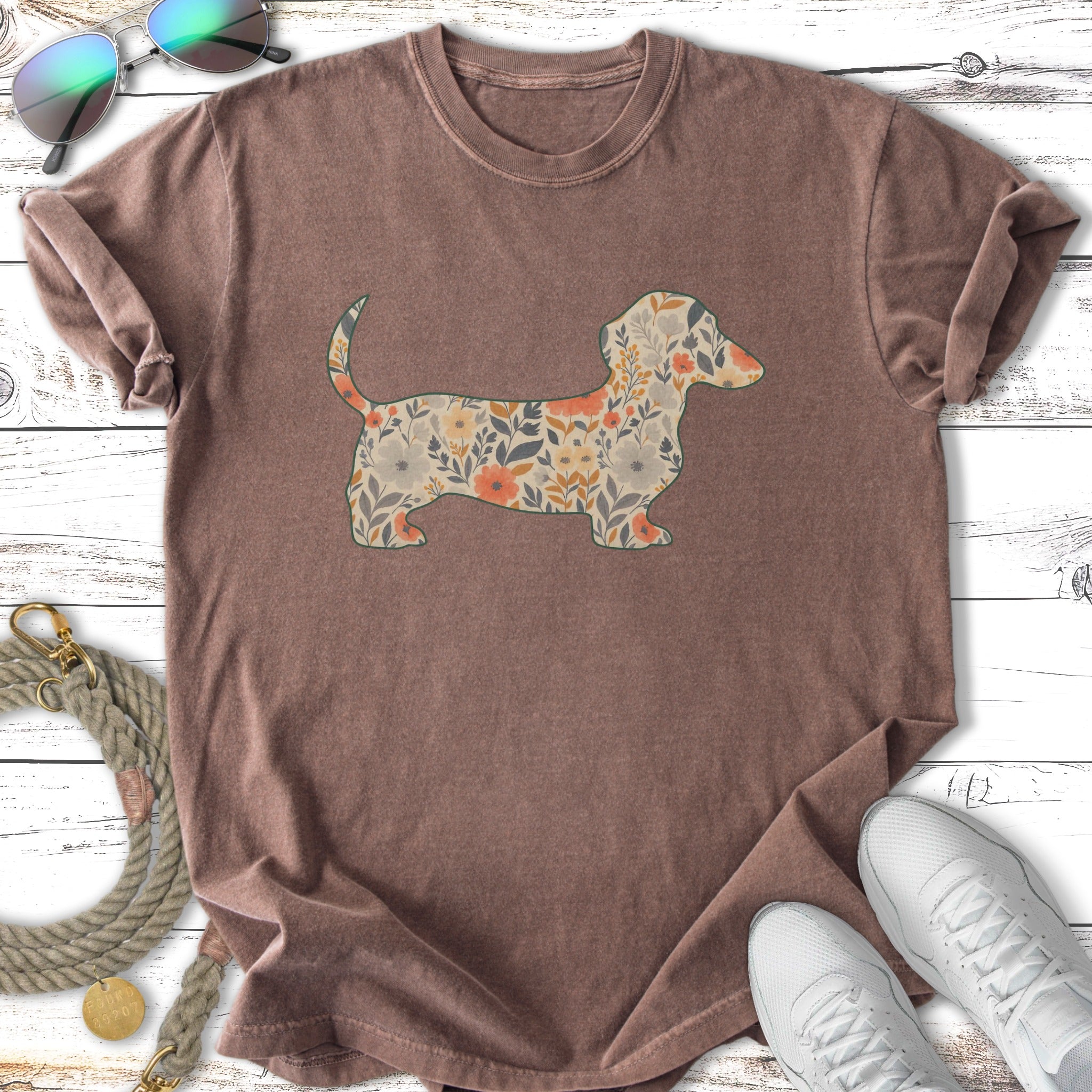 Brown t-shirt with a floral dachshund graphic and sunglasses.