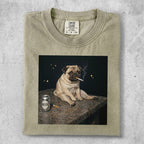 Pug smoking a cigarette next to a can of beer on a dark background.