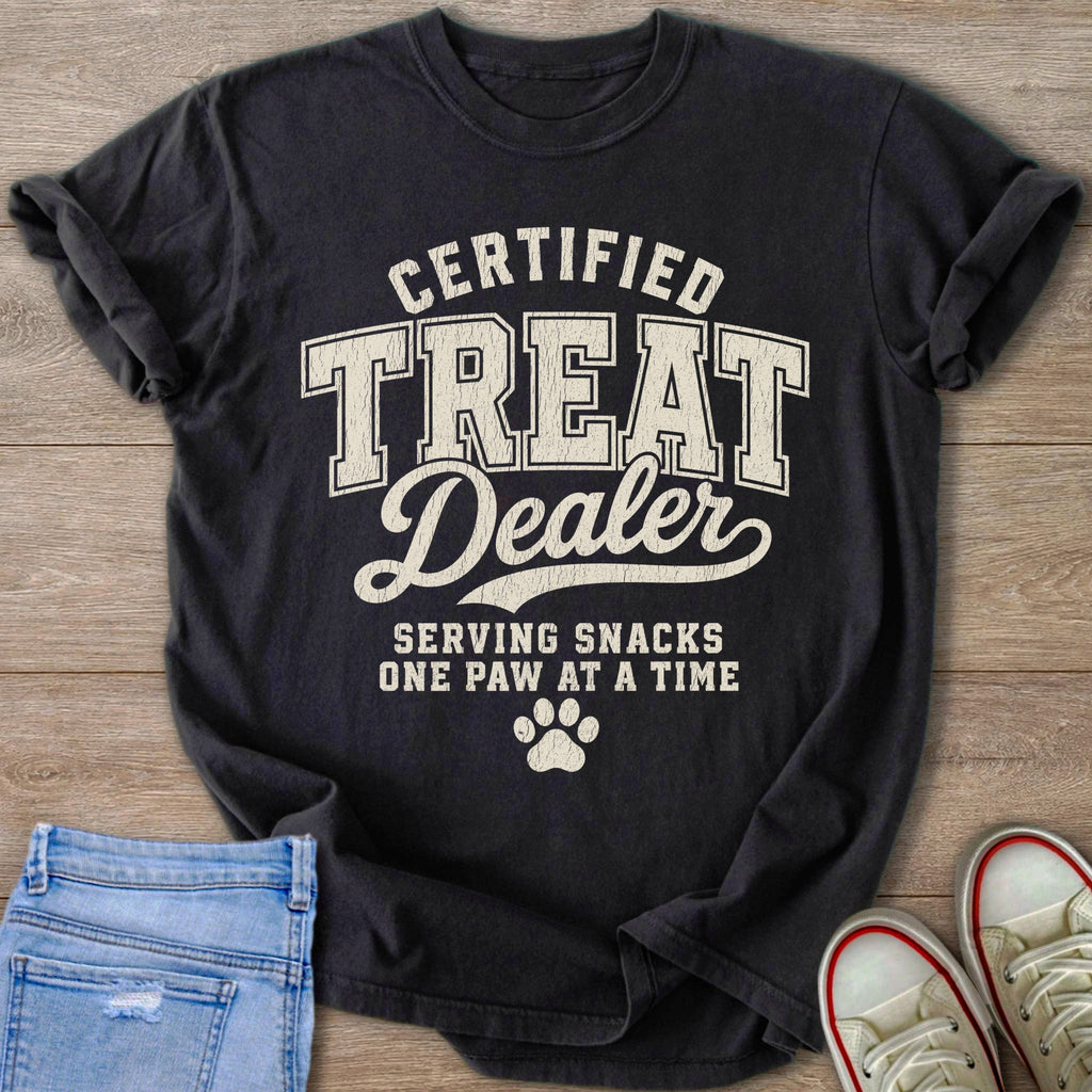 Black t-shirt with text "Certified Treat Dealer, Serving Snacks One Paw At A Time".