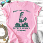 Pink t-shirt with "Gardening and Dogs" and "Because Murder Is Wrong" text.