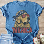 Golden retriever dog wearing patriotic bandana and sunglasses, with 'Merica text.