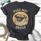 Pugs not drugs text with pug wearing sunglasses on a t-shirt.