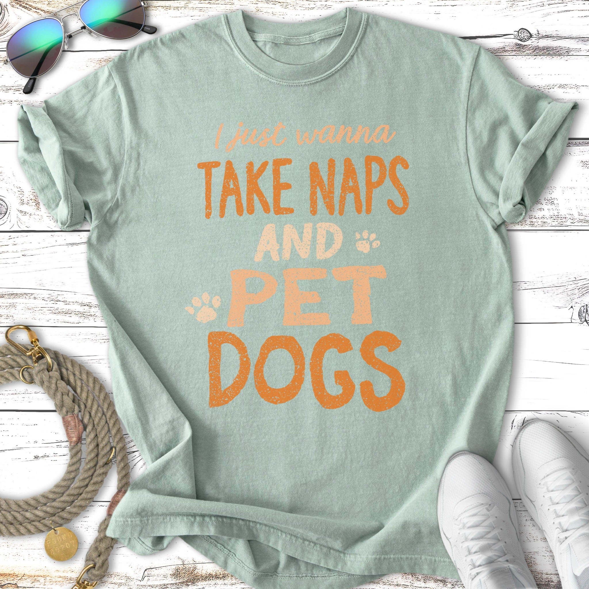 Light green t-shirt with text "I just wanna take naps and pet dogs."