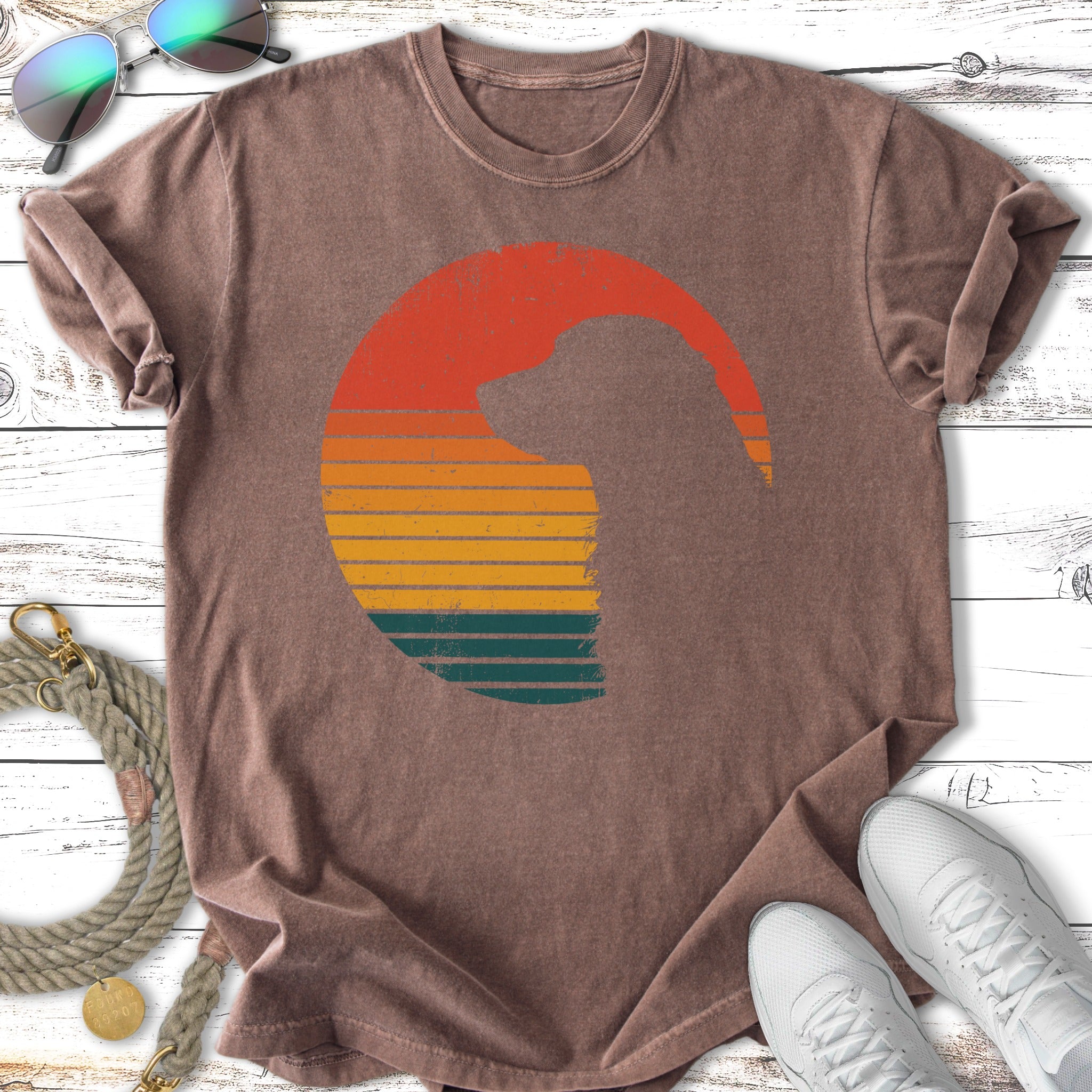 T-shirt with a vintage-style sunset silhouette of a dog.
