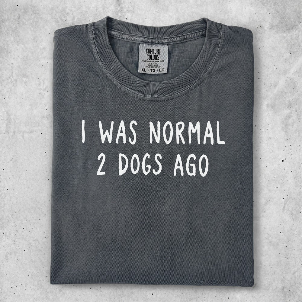 Comfort Colors t-shirt with "I WAS NORMAL 2 DOGS AGO" text.